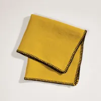 serviette de table nino ocre et feston noir - jaune